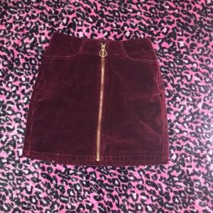 Size 0 red zip up mini jean skirt